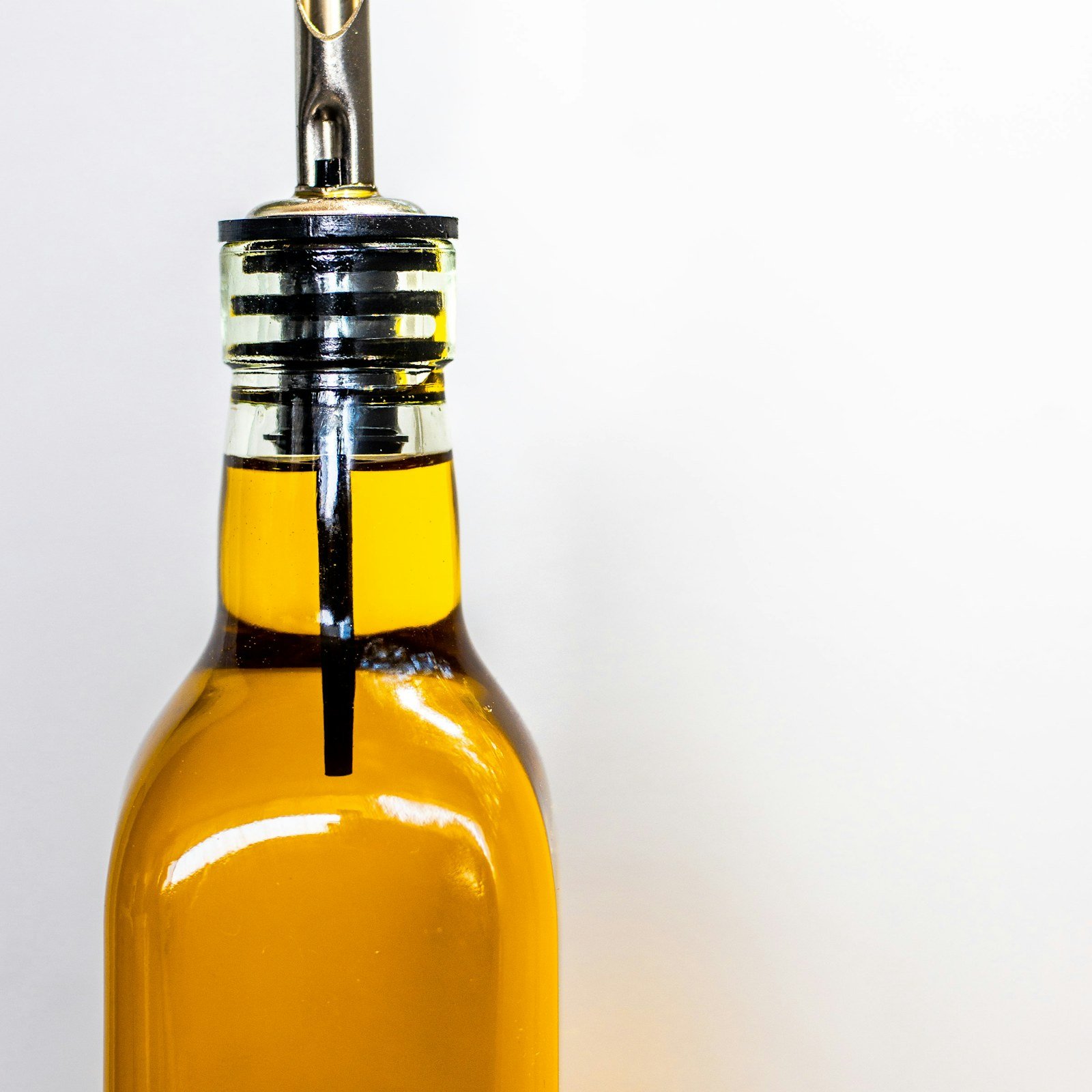 Oil in a glass pourer bottle